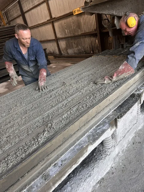 Concrete being worked on the casting line in the EFC Fencing yard